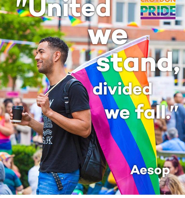 United we stand, divided we fall - gay black man and rainbow flag